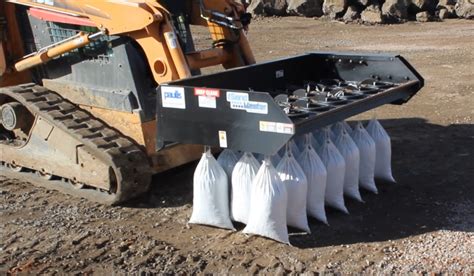 skid steer moving sand|sandmaster skid steer attachment.